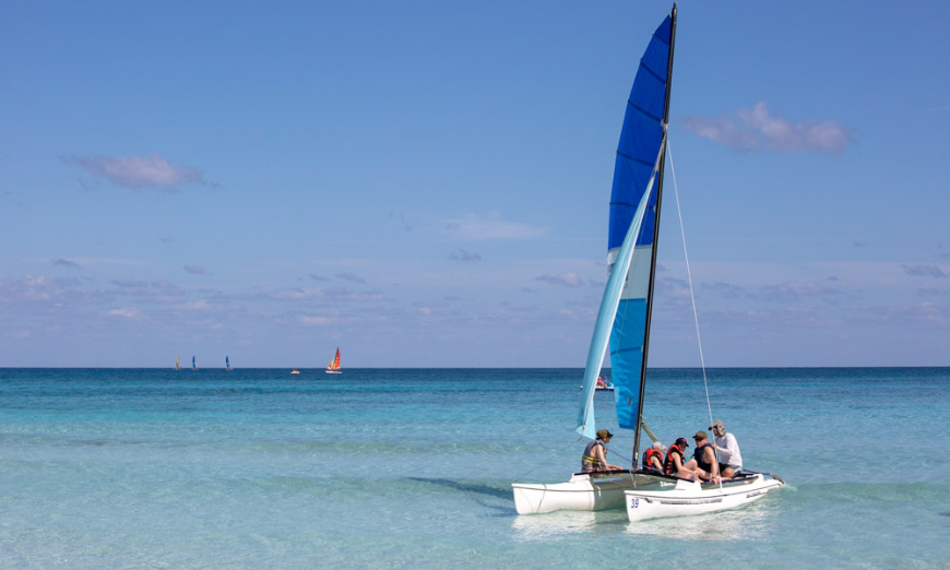 Are Cuba's Beaches Nice Image: A catamaran takes off into Cuba's seas.