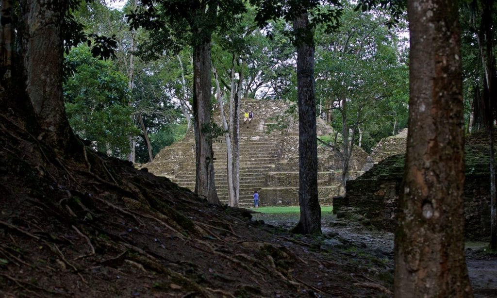 Nothing says, “I'm having an adventure!” quite like making your way up a pyramid. Rainforests & Natural Wonders Image: Cahal Pech. A stepped pyramid sits in the middle of the forest; a few travellers are making the trek up to take in the view.