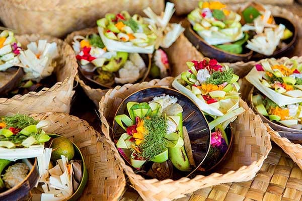 Destinations Worth Dreaming Image: Delicious and colourful meals sit in woven baskets.