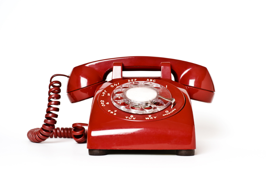 Who you gonna' call? ANYWHERE! Booking A Vacation Online Image: A red rotary dial telephone.
