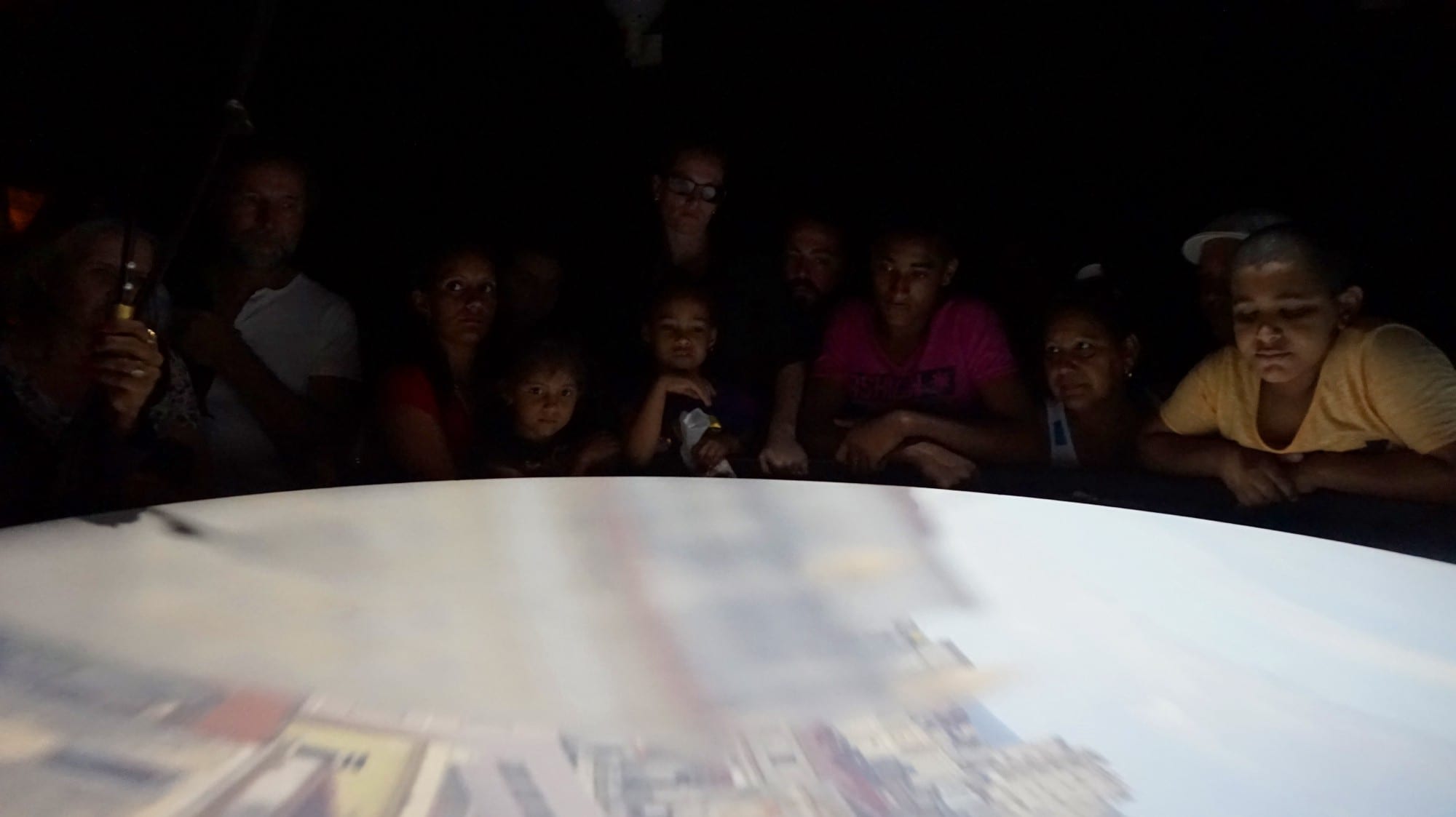 Your digital camera's got nothing on this old-fashioned method. Cuba Unusual Museum Image: A group of visitors observe one of the city's images being displayed on a surface.