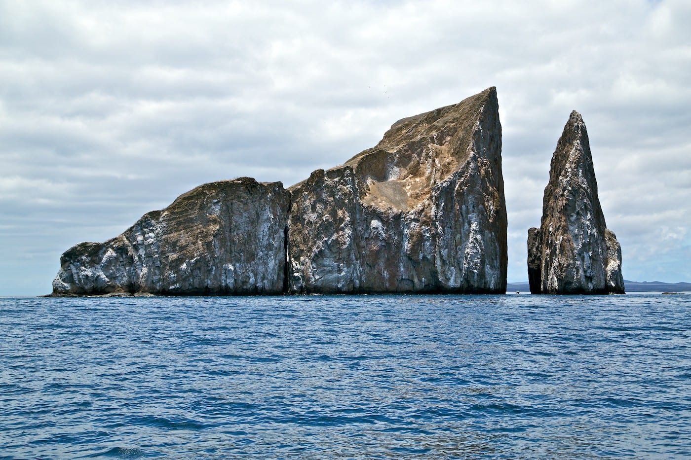 Photos Of The Galápagos Image: The opening of 25 photos of the Galápagos: A photograph of Kicker Rock, which formed as a result of hot lava shooting out of cold water.