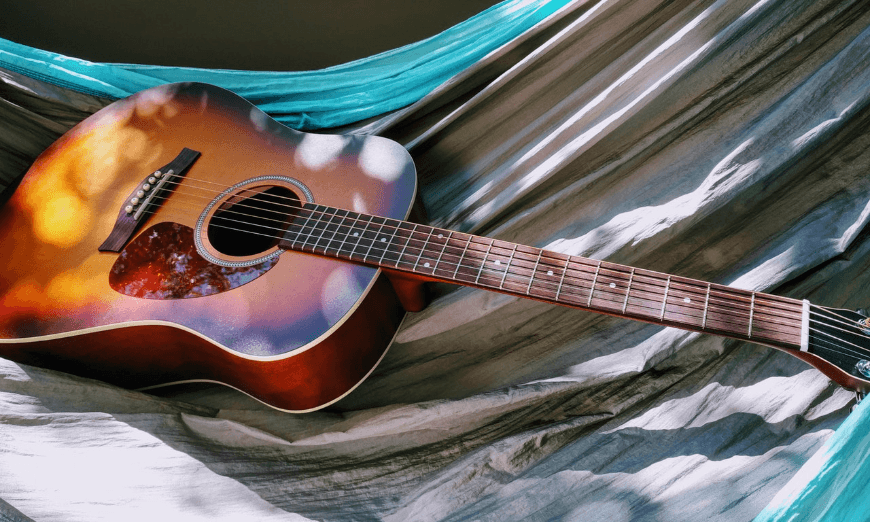 No long do you have to start your sentences with, “I used to...(play the guitar, paint, take photographs).” Moving Abroad Image: A guitar sits on a hammock.