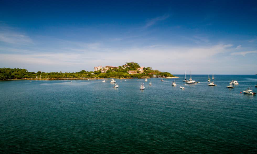 Pacific and Caribbean Costa Rica Image: The Flamingo Beachfront as seen from a distance.