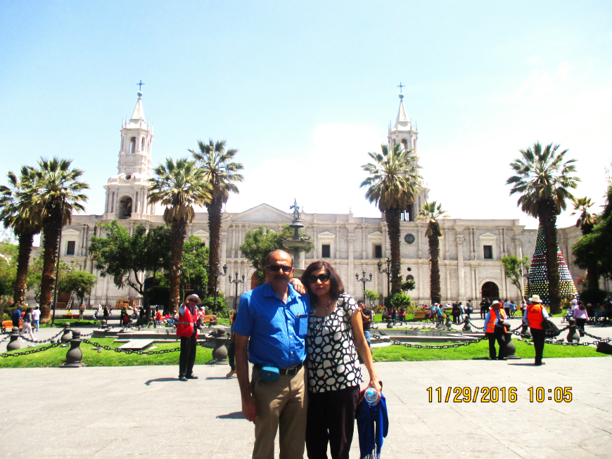 Peru Group Tour Image: Mr. and Mrs. Nayak pose in front of a cathedral.