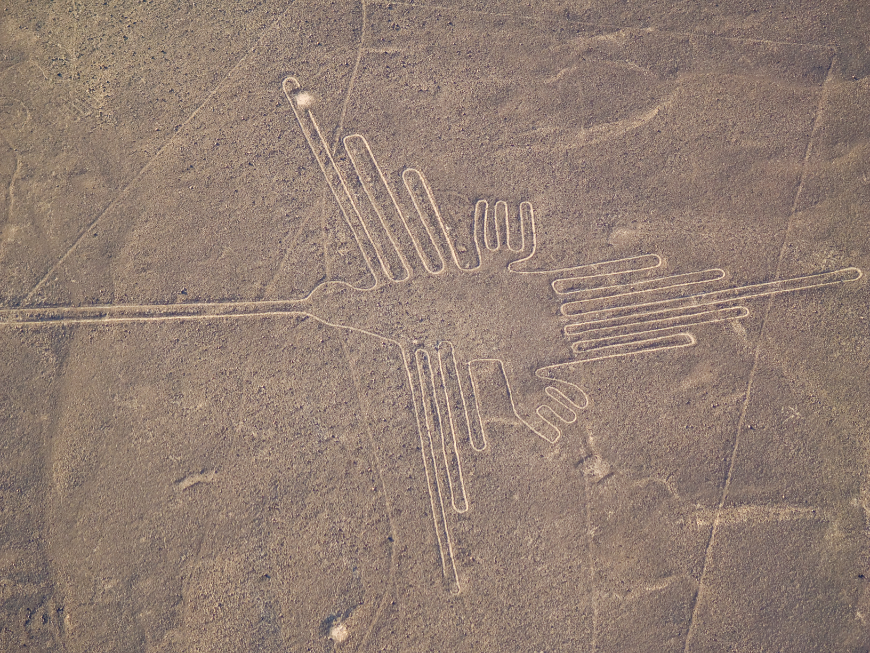 Peru or Ecuador Image: A geoglyph of a hummingbird is etched into Peru's landscape.