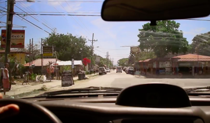 Is It Safe to Travel in Costa Rica Image: View of a town through a driver