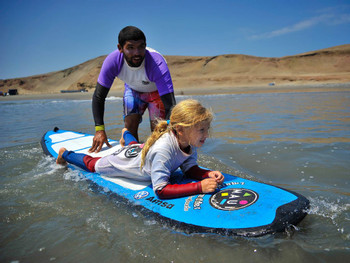 Surf Lessons at Makaha Beach in Lima photo 2