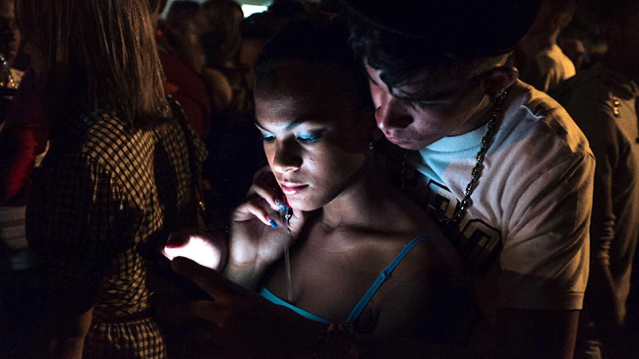 Cubans Using Public Wi-Fi Cubans using public Wi-Fi